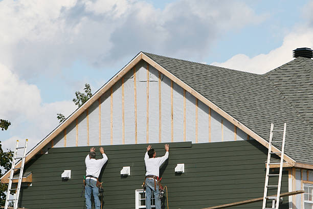 Professional Siding Installation technician working in Montgomery, IN